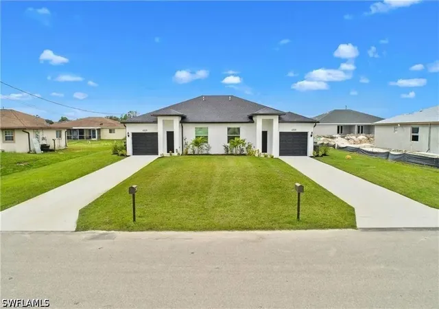 Photo 1 of Multi family home for sale at 717/719 Gordon Ave S, Lehigh Acres, FL 33973 | MLS# 226026444 | Listing updated on 2026-09-09