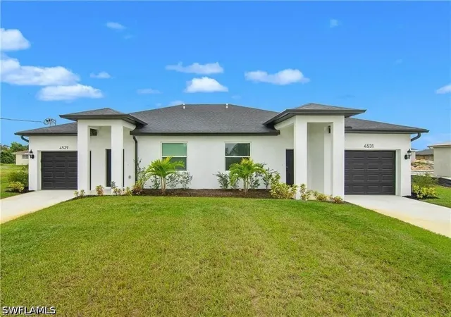 Photo 2 of Multi family home for sale at 717/719 Gordon Ave S, Lehigh Acres, FL 33973 | MLS# 226026444 | Listing updated on 2026-09-09
