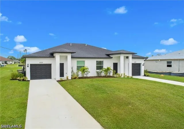 Photo 3 of Multi family home for sale at 717/719 Gordon Ave S, Lehigh Acres, FL 33973 | MLS# 226026444 | Listing updated on 2026-09-09