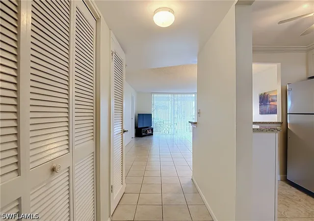 Listing Photo 4 - Condo for sale in building located at 100 Forest Lakes Blvd, Naples, FL 34105 - Unit #109