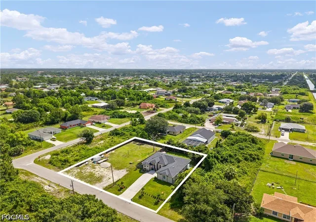 Photo 2 of Single family home for sale at 1405 Bruce Ave S, Lehigh Acres, FL 33976 | MLS# 2026030902 | Listing updated on 2026-09-14