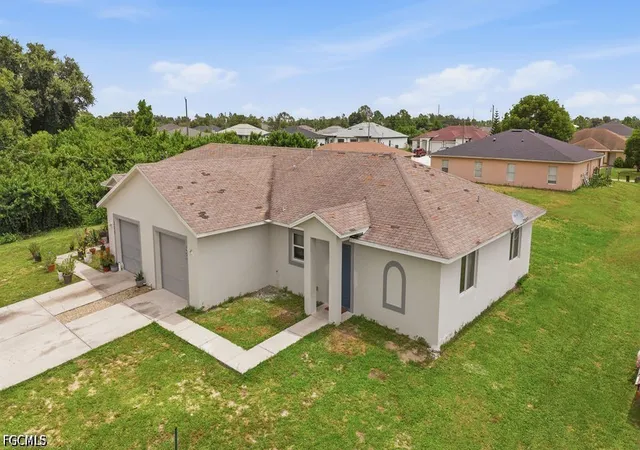 Multi family home for sale at 205/207 Homer Ave S, Lehigh Acres, FL 33973 | MLS# 2026030956