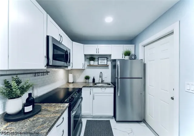 Listing Photo 4 - Condo for sale in building located at 1104 Vineyard St, Lehigh Acres, FL 33936