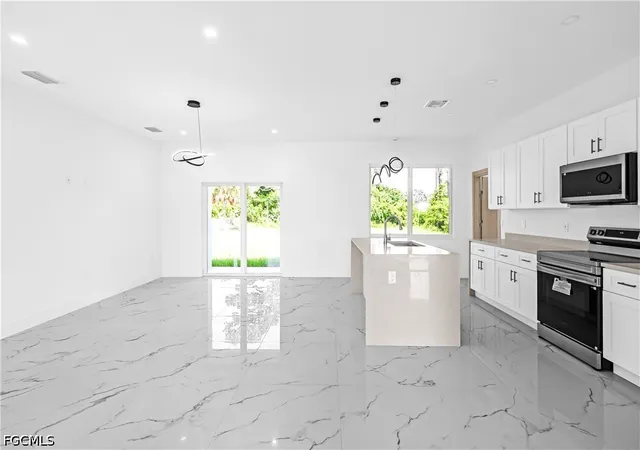 Photo 3 of Single family home for sale at 718 Robert Ave, Lehigh Acres, FL 33936 | MLS# 2026031063 | Listing updated on 2026-09-10