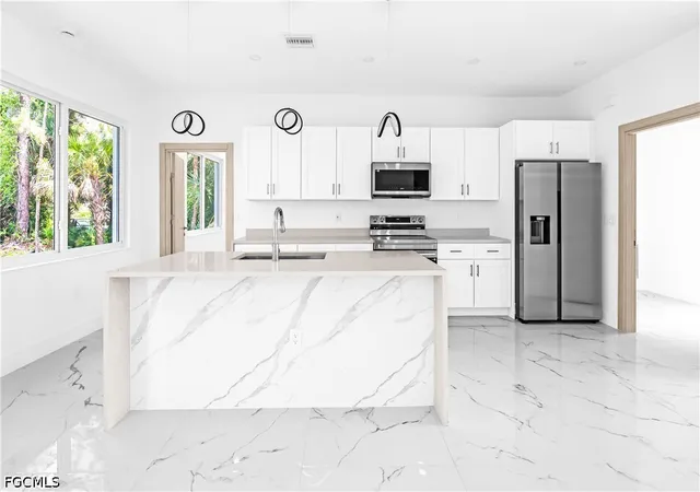 Photo 3 of Single family home for sale at 718 Robert Ave, Lehigh Acres, FL 33936 | MLS# 2026031063 | Listing updated on 2026-09-10