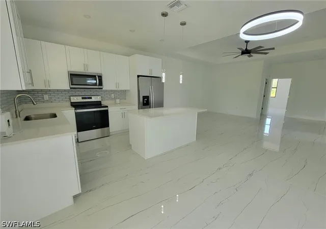 Photo 2 of House for sale at 884-886 Milwaukee Blvd, Lehigh Acres, FL 33974 | MLS# 226025855 | Listing updated on 2026-09-16