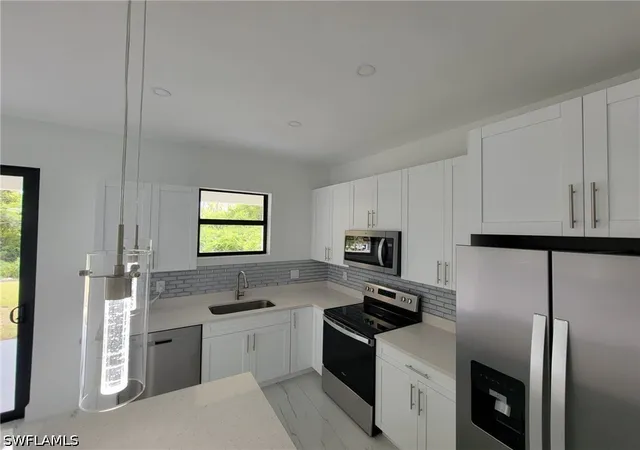 Photo 3 of House for sale at 884-886 Milwaukee Blvd, Lehigh Acres, FL 33974 | MLS# 226025855 | Listing updated on 2026-09-16