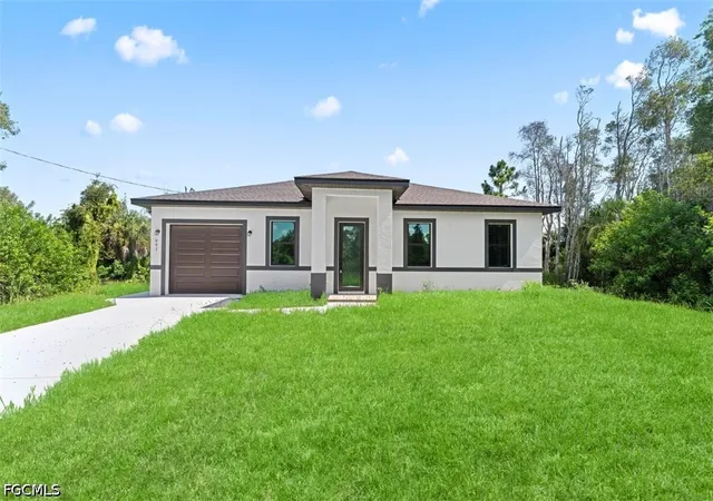 Photo 1 of Sale Pending at 991 Plantation Rd, Lehigh Acres, FL 33974 | MLS# 2026031510 | Listing updated on 2026-09-14