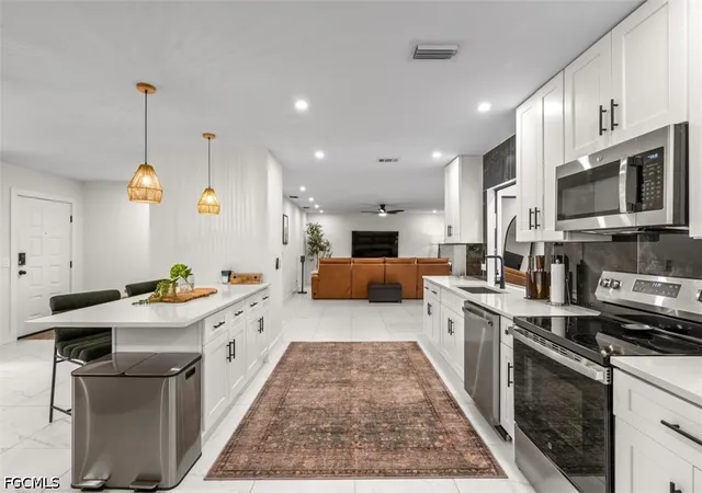 Photo 3 of Single family home for sale at 14725 Kimberly Ln, Fort Myers, FL 33908 | MLS# 2026031554 | Listing updated on 2026-09-04