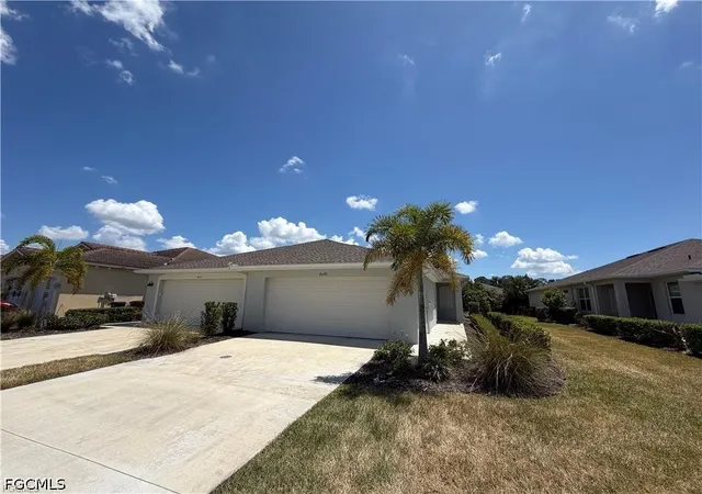 Photo 1 of Townhouse for sale at 9077 Leatherwood Loop, Lehigh Acres, FL 33936 | MLS# 2026032209 | Listing updated on 2026-09-10