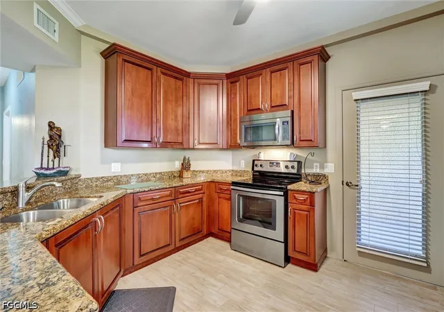Listing Photo 1 - Condo for sale in building located at 1750 Concordia Lake Cir, Cape Coral, FL 33909 - Unit #101