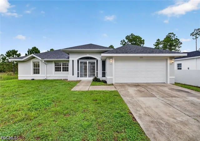 Photo 1 of Sale Pending at 1235 Cloplon St E, Lehigh Acres, FL 33974 | MLS# 2026032400 | Listing updated on 2026-10-09