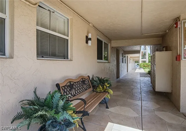Listing Photo 4 - Condo for sale in building located at 9 High Pt Cir N, Naples, FL 34103 - Unit #108