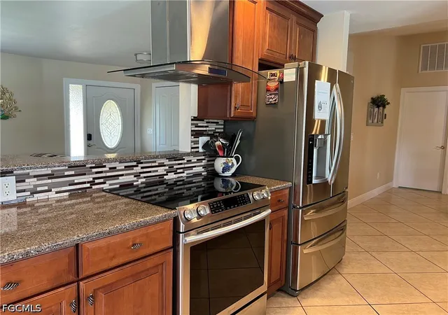 Photo 3 of Single family home for sale at 1124 SE 29th Street, Cape Coral, FL 33904 | MLS# 2026032772 | Listing updated on 2026-09-15