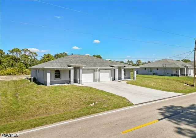 Photo 3 of Sale Pending at 1400/1402 W 12th Street, Lehigh Acres, FL 33972 | MLS# 2026033099 | Listing updated on 2026-09-17