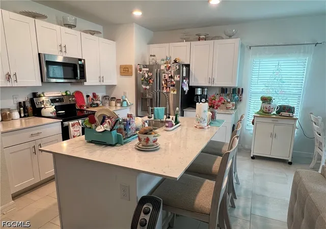 Photo 3 of Townhouse for sale at 14265 Oviedo Pl, Fort Myers, FL 33905 | MLS# 2026033278 | Listing updated on 2026-09-26