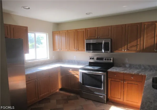 Photo 4 of Single family home for sale at 1622 NE 33rd Terrace, Cape Coral, FL 33909 | MLS# 2026033343 | Listing updated on 2026-09-16