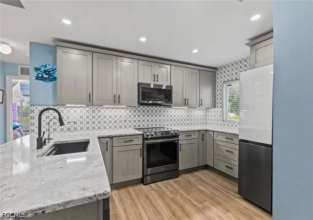 Photo 4 of Single family home for sale at 1208 NW 15th Place, Cape Coral, FL 33993 | MLS# 2026033798 | Listing updated on 2026-09-10
