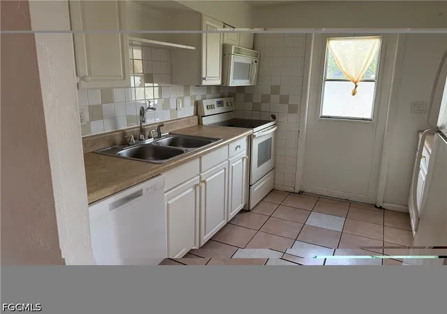 Photo 3 of Sale Pending at 1131 S Loop Blvd, Lehigh Acres, FL 33936 | MLS# 2026033806 | Listing updated on 2026-09-15