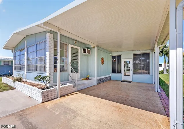 Photo 3 of Manufactured home for sale at 557 Peace Lake Ct, North Fort Myers, FL 33917 | MLS# 2026033844 | Listing updated on 2026-10-04