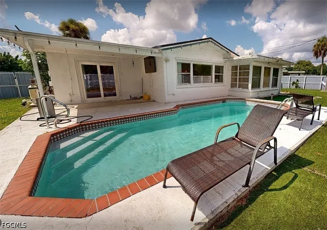 Photo 1 of Single family home for sale at 129 E Lake Dr, Lehigh Acres, FL 33936 | MLS# 2026033881 | Listing updated on 2026-09-14