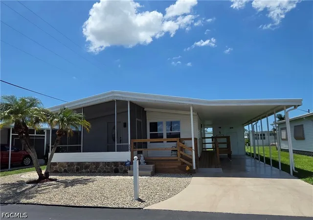 Photo 1 of Manufactured home for sale at 556 Freedom St, North Fort Myers, FL 33917 | MLS# 2026034147 | Listing updated on 2026-09-07