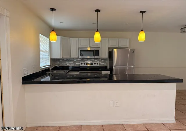 Photo 3 of Condo for sale at 4290 Gulfstream Dr #12, Naples, FL 34112 | MLS# 226028857 | Listing updated on 2026-09-07