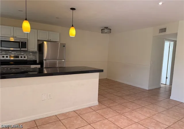 Photo 4 of Condo for sale at 4290 Gulfstream Dr #12, Naples, FL 34112 | MLS# 226028857 | Listing updated on 2026-09-07