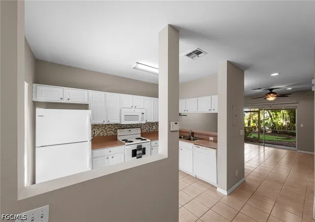 Photo 3 of Townhouse for sale at 10032 Poppy Hl Dr, Fort Myers, FL 33966 | MLS# 2026034226 | Listing updated on 2026-09-15