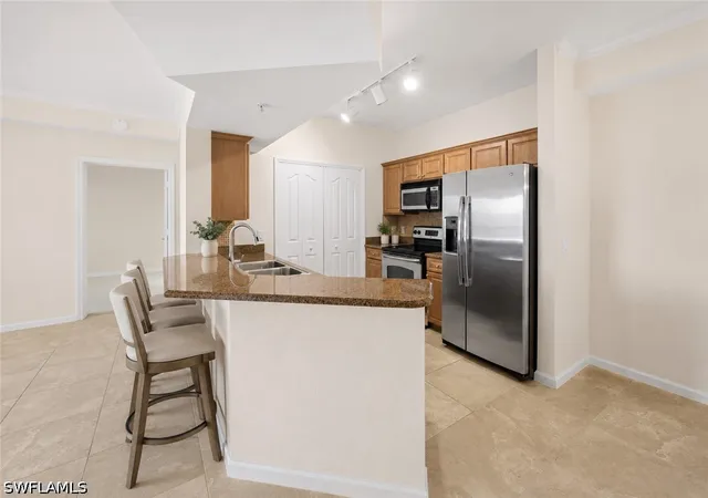Listing Photo 4 - Condo for sale in building located at 13000 Positano Cir, Naples, FL 34105 - Unit #204