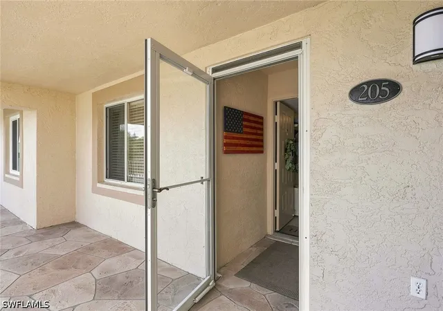 Listing Photo 3 - Condo for sale in building located at 7360 Glenmoor Ln, Naples, FL 34104 - Unit #205