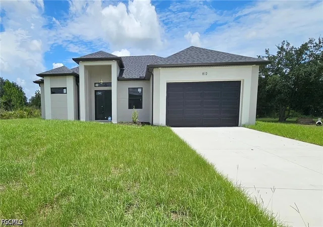 Photo 1 of Single family home for sale at 812 Hibiscus Ave, Lehigh Acres, FL 33972 | MLS# 2026034641 | Listing updated on 2026-09-09