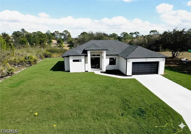 Photo 2 of Single family home for sale at 812 Hibiscus Ave, Lehigh Acres, FL 33972 | MLS# 2026034641 | Listing updated on 2026-09-09