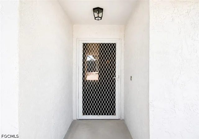 Listing Photo 4 - Condo for sale in building located at 13711 Raleigh Ln, Fort Myers, FL 33919 - Unit #7