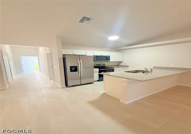 Photo 3 of Multi family home for sale at 1103 1101 Harold Ave S, Lehigh Acres, FL 33973 | MLS# 2026034783 | Listing updated on 2026-09-06