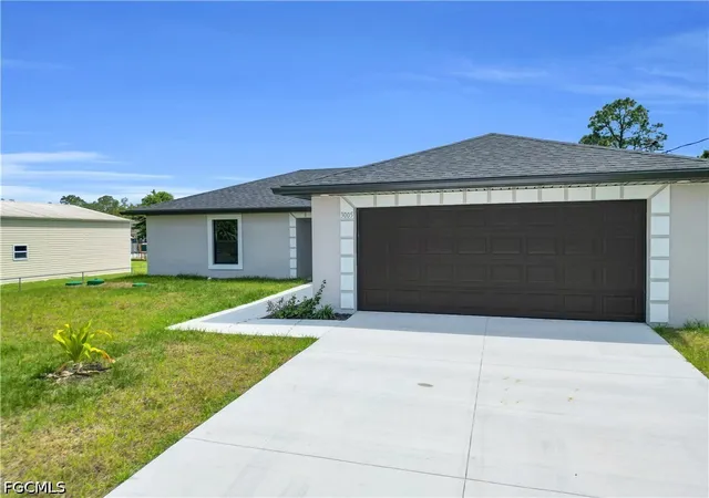 Photo 1 of Single family home for sale at 823 Mckinley Ave, Lehigh Acres, FL 33972 | MLS# 2026034884 | Listing updated on 2026-09-07