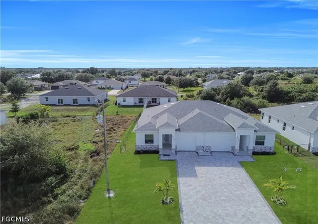Photo 1 of Multi family home for sale at 424 426 Grant Blvd, Lehigh Acres, FL 33974 | MLS# 2026035019 | Listing updated on 2026-09-11
