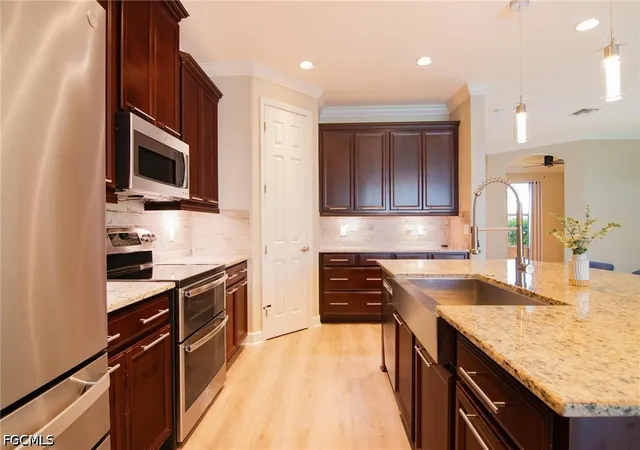 Photo 3 of Single family home for sale at 2705 Lambay Ct, Cape Coral, FL 33991 | MLS# 2026035177 | Listing updated on 2026-09-30