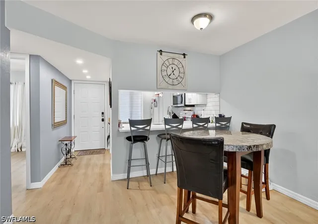 Listing Photo 4 - Condo for sale in building located at 5857 Rattlesnake Hammock Rd N, Naples, FL 34113 - Unit #106