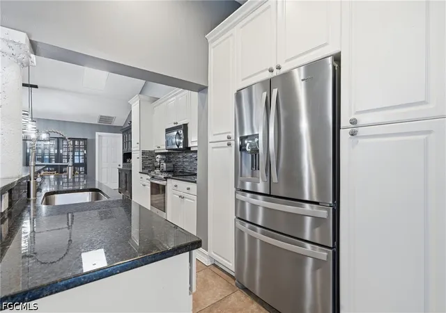 Photo 3 of Single family home for sale at 2202 Sw 14th Ave, Cape Coral, FL 33991 | MLS# 2026035227 | Listing updated on 2026-09-13