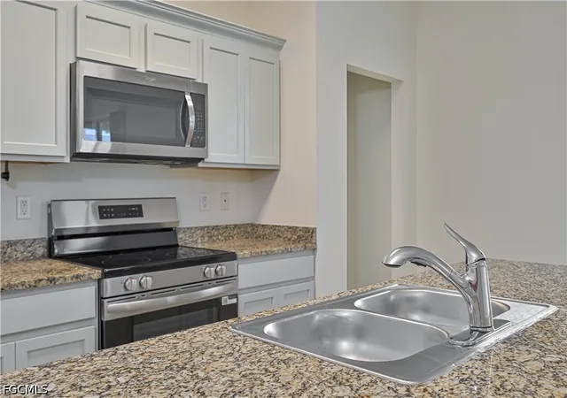 Photo 4 of Single family home for sale at 4214 NW 32nd Lane, Cape Coral, FL 33993 | MLS# 2026035297 | Listing updated on 2026-10-19