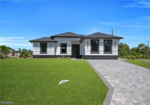 Photo 1 of Single family home for sale at 1907 W 14th Street, Lehigh Acres, FL 33972 | MLS# 2026035305 | Listing updated on 2026-09-12