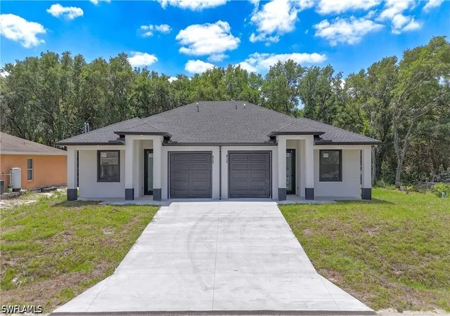 Photo 1 of Multi family home for sale at 613/615 W 12th Street, Lehigh Acres, FL 33972 | MLS# 226030044 | Listing updated on 2026-09-10