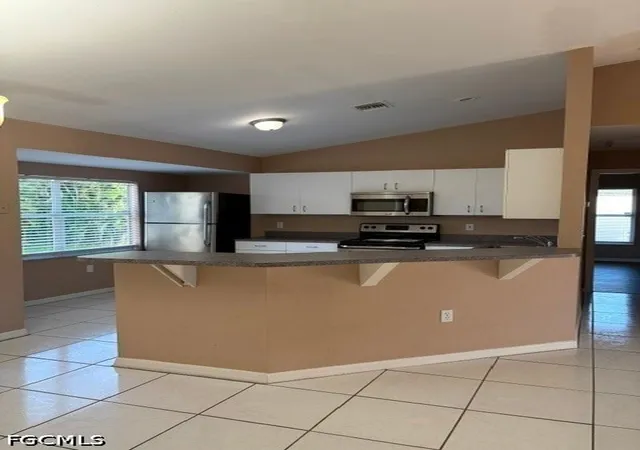 Photo 2 of Single family home for sale at 1822 Sw 18th Street, Cape Coral, FL 33991 | MLS# 2026035376 | Listing updated on 2026-09-15