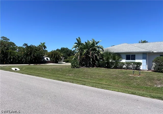 Listing Photo 5 - Condo for sale in building located at 702 109th Ave N, Naples, FL 34108