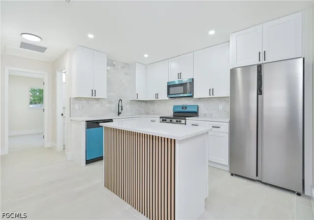 Photo 4 of House for sale at 115 SE 24th Avenue #A+B, Cape Coral, FL 33990 | MLS# 2026035525 | Listing updated on 2026-09-12