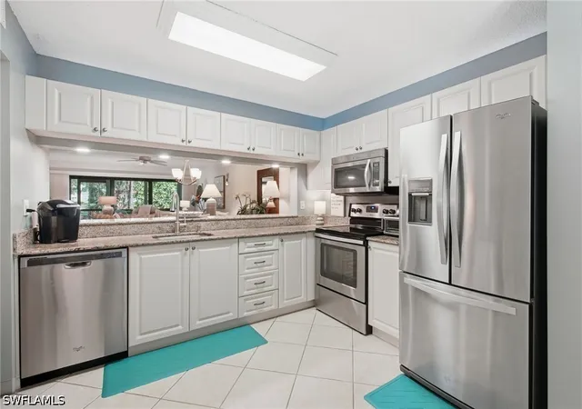 Listing Photo 5 - Condo for sale in building located at 5767 Deauville Cir, Naples, FL 34112 - Unit #D106