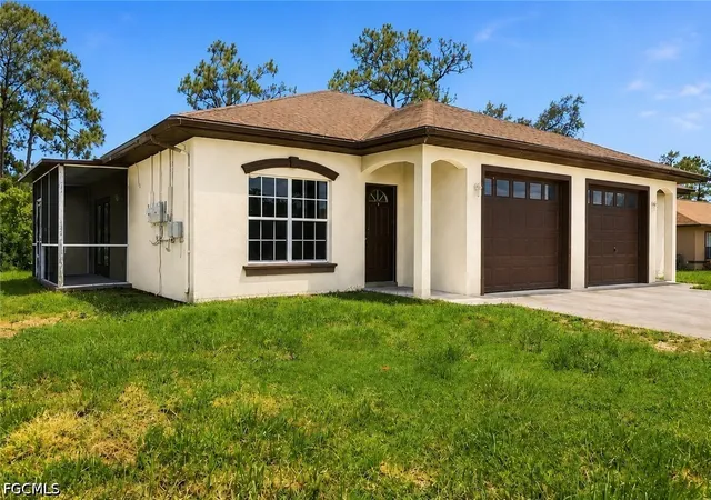 Photo 1 of Multi family home for sale at 2433 George Ave S, Lehigh Acres, FL 33973 | MLS# 2026035663 | Listing updated on 2026-09-11