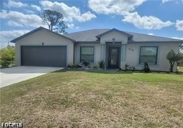 Photo 1 of Single family home for sale at 818 Albert Ave, Lehigh Acres, FL 33971 | MLS# 2026035779 | Listing updated on 2026-10-14
