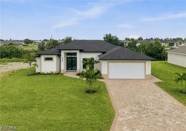 Photo 1 of Single family home for sale at 307 Ne 15th Street, Cape Coral, FL 33909 | MLS# 2026035795 | Listing updated on 2026-09-03